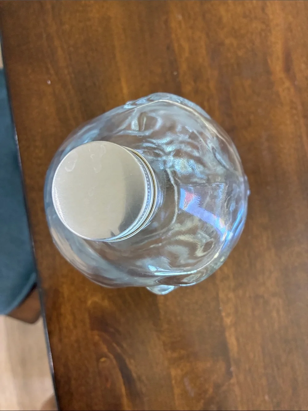 Clear Glass Skull Bottle with Silver Cap